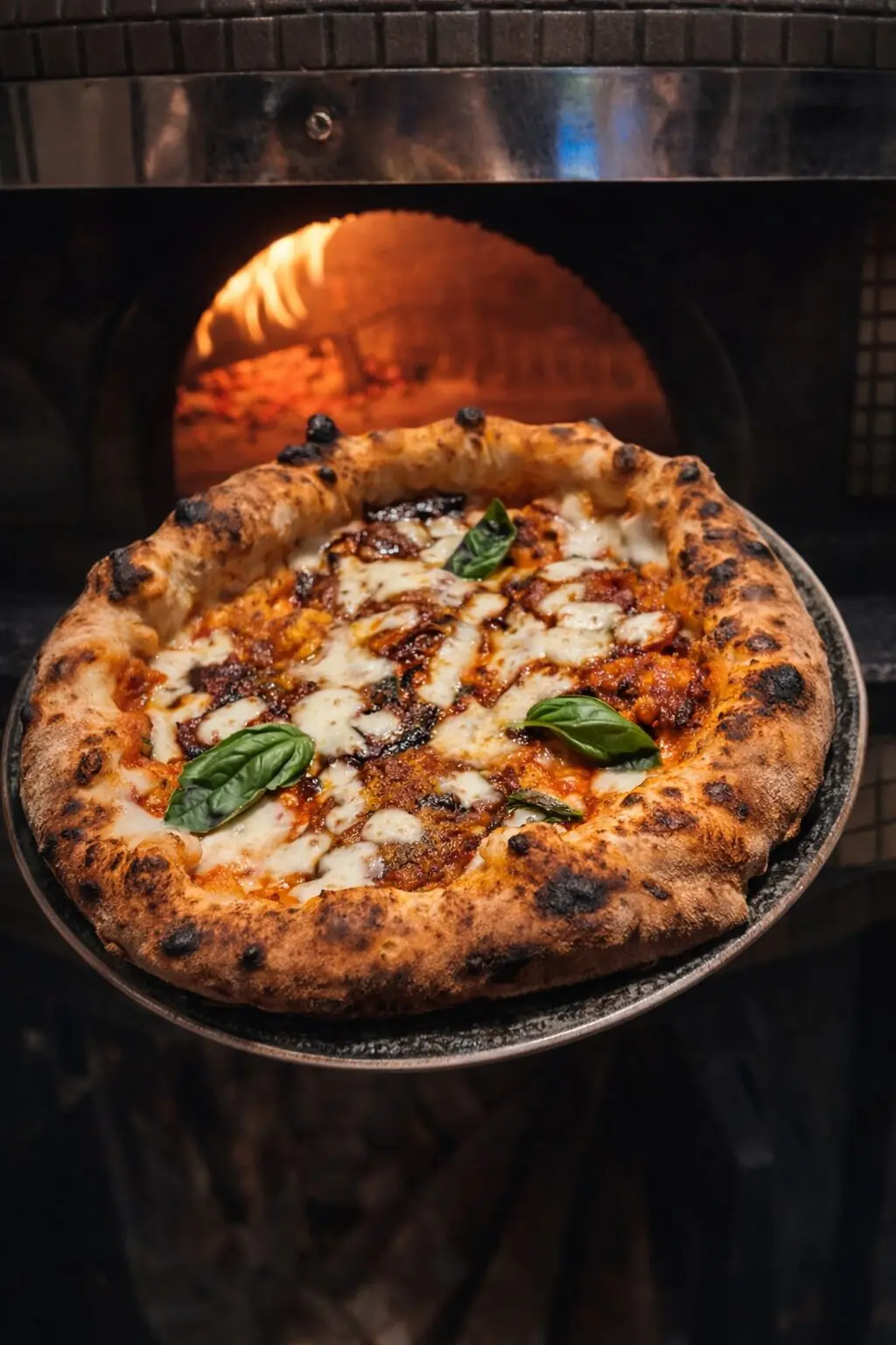 A Parmigian e Mulignan, la pizza